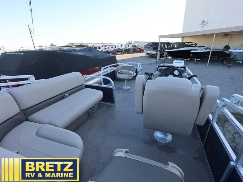 Slide: The Image of 2025 BASS BUGGY 18 DLX pontoon boat interior at Bretz RV & Marine dealership. - 7