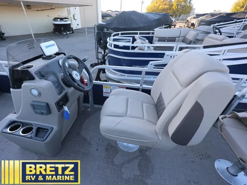 Slide: The Image of 2025 BASS BUGGY 18 DLX pontoon boat interior with steering console and seating at Bretz RV & Marine. - 8