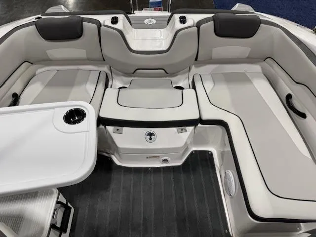 Slide: The Image of 2025 Yamaha Boats SX190 interior with seating and table setup. - 11