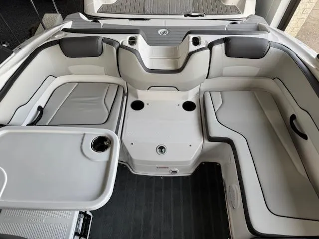 Slide: The Image of 2025 Yamaha Boats AR190 interior with seating and table setup. - 10