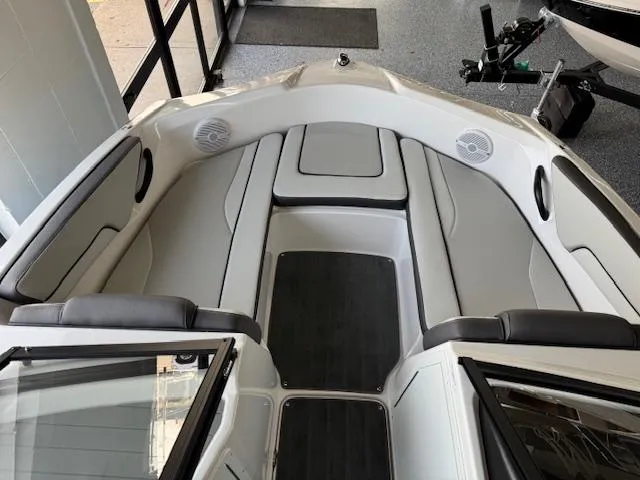 Slide: The Image of 2025 Yamaha Boats AR190 interior with sleek seating and modern design. - 2