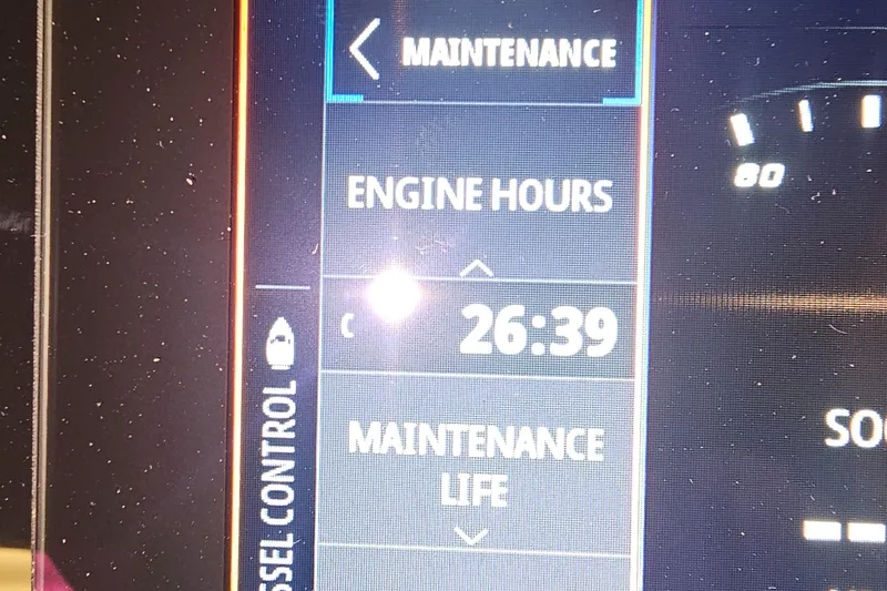 Slide: The Image of Sea Ray SLX 250 2022 maintenance display showing 26:39 engine hours. - 22