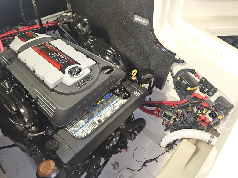 Slide: The Image of Engine compartment of 2022 Sea Ray SLX 250 boat, featuring a powerful 6.2L engine. - 26