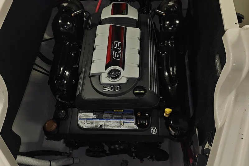 Slide: The Image of 2022 Sea Ray SLX 250 engine compartment with 6.2L 300 HP engine. - 28