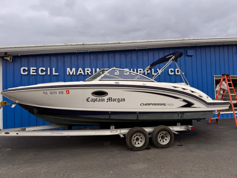The Image of 2012 Chaparral 244 Sunesta boat on trailer outside Cecil Marine Supply. - 0