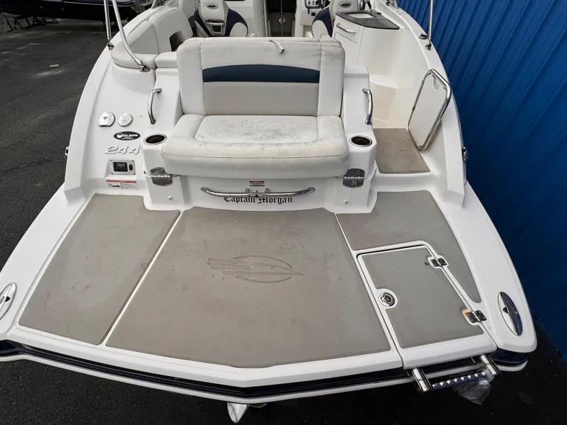 Slide: The Image of 2012 Chaparral 244 Sunesta boat with spacious seating and swim platform. - 20