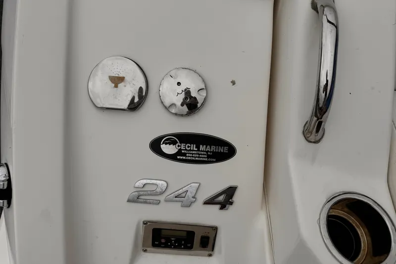 Slide: The Image of Close-up of 2012 Chaparral 244 Sunesta boat details and branding. - 23