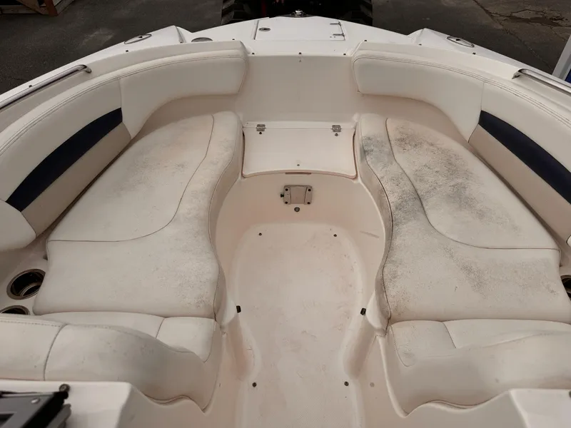 Slide: The Image of Interior seating of a 2012 Chaparral 244 Sunesta boat, showing wear and discoloration. - 5