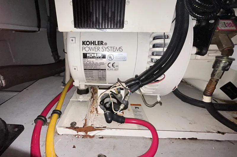 Slide: The Image of Kohler power system in 2004 Silverton 39 Motor Yacht engine room. - 42