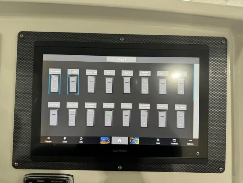 Slide: The Image of Garmin touchscreen display on 2016 Yellowfin 39 boat dashboard. - 10