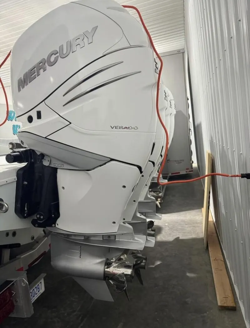 Slide: The Image of 2016 Yellowfin 39 boat with Mercury Verado outboard engines in storage. - 14