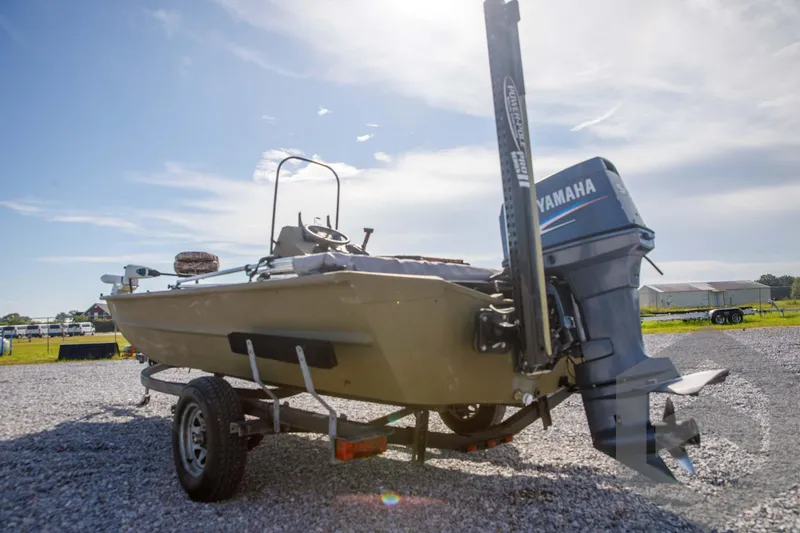 Slide: The Image of 2003 Polar Kraft Sportsman MV1885CC boat with Yamaha motor on trailer. - 15