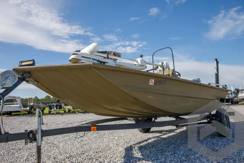 Slide: The Image of 2003 Polar Kraft Sportsman MV1885CC boat on trailer under blue sky. - 18