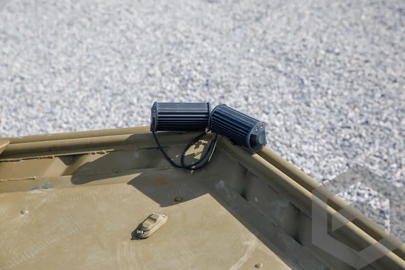 Slide: The Image of 2003 Polar Kraft Sportsman MV1885CC boat detail with mounted black lights. - 24