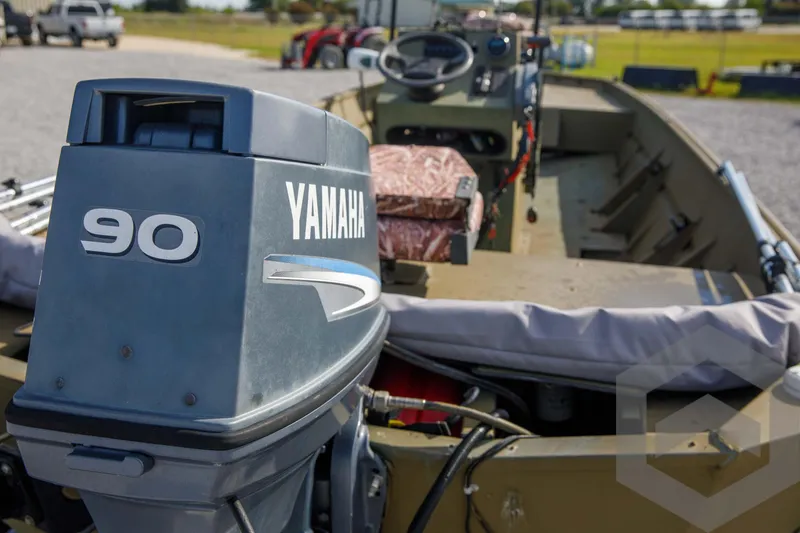 Slide: The Image of 2003 Polar Kraft Sportsman MV1885CC boat with Yamaha 90 outboard motor. - 37