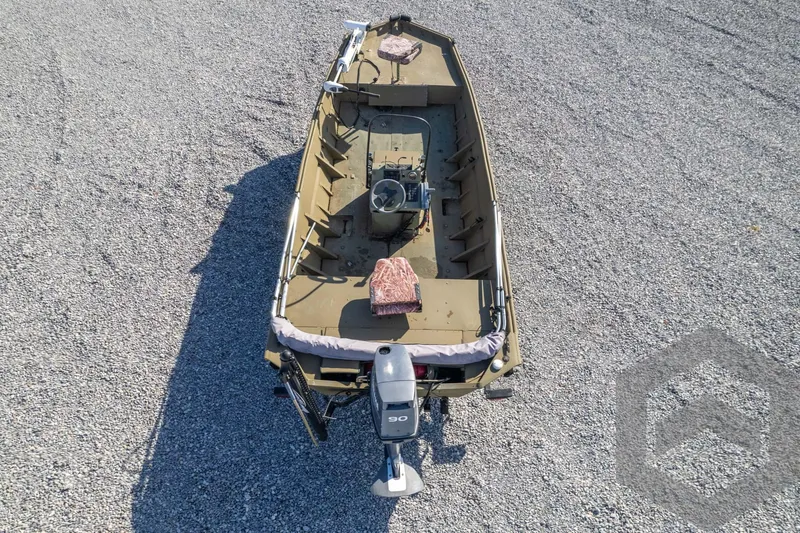 Slide: The Image of 2003 Polar Kraft Sportsman MV1885CC boat on gravel surface, aerial view. - 42
