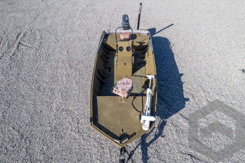 Slide: The Image of 2003 Polar Kraft Sportsman MV1885CC boat on gravel surface, aerial view. - 46