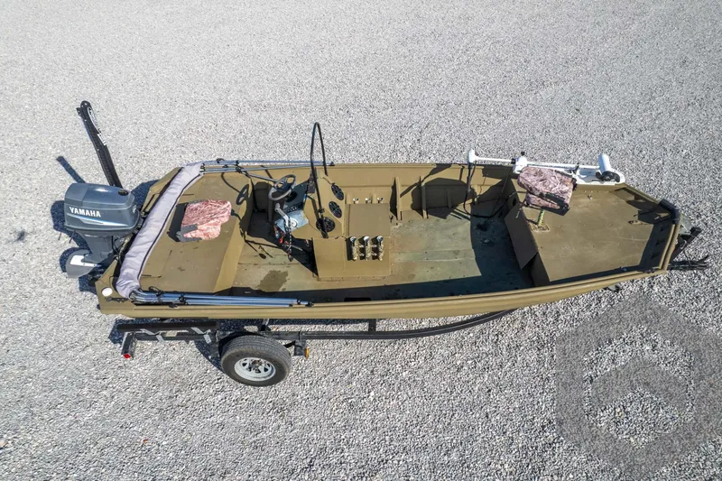 Slide: The Image of 2003 Polar Kraft Sportsman MV1885CC boat on trailer, aerial view. - 48