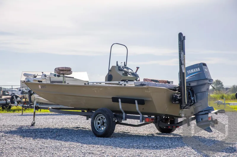 Slide: The Image of 2003 Polar Kraft Sportsman MV1885CC boat on trailer with Yamaha outboard motor. - 6