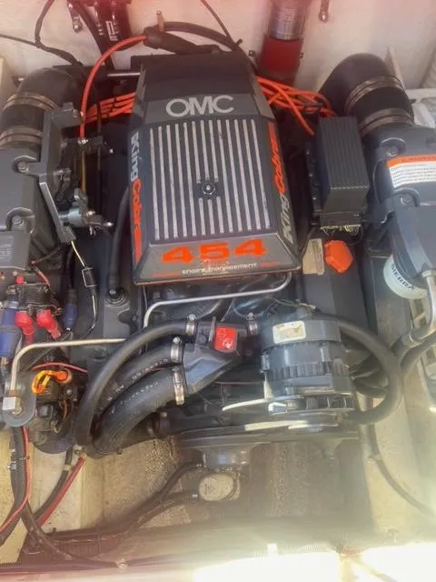 Slide: The Image of 1993 Chris-Craft Select Cuddy OMC 454 engine in boat compartment. - 11