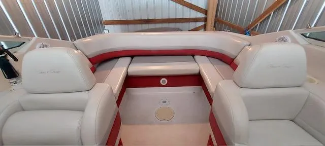 Slide: The Image of 1993 Chris-Craft Select Cuddy boat interior with white and red seating. - 4