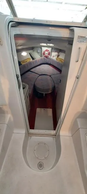 Slide: The Image of Interior view of 1993 Chris-Craft Select Cuddy cabin with seating and storage. - 6