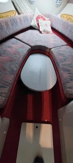 Slide: The Image of 1993 Chris-Craft Select Cuddy interior with red and gray seating. - 7