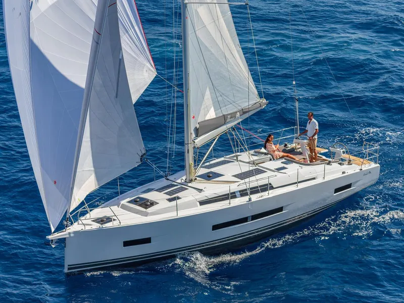 The Image of 2025 Hanse 410 sailboat cruising on blue ocean waters. - 0