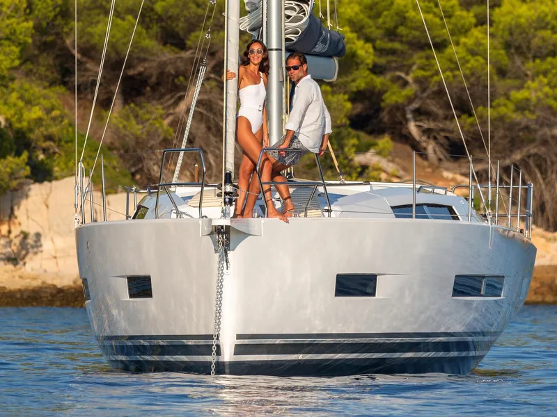 Slide: The Image of Couple enjoying a sunny day on a 2025 Hanse 410 yacht. - 33
