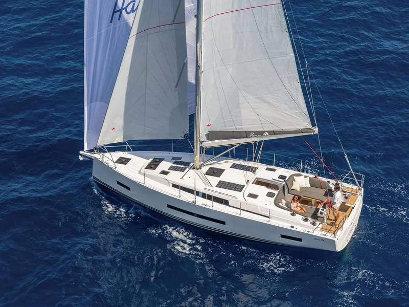 Slide: The Image of 2025 Hanse 410 sailboat cruising on open blue sea. - 42