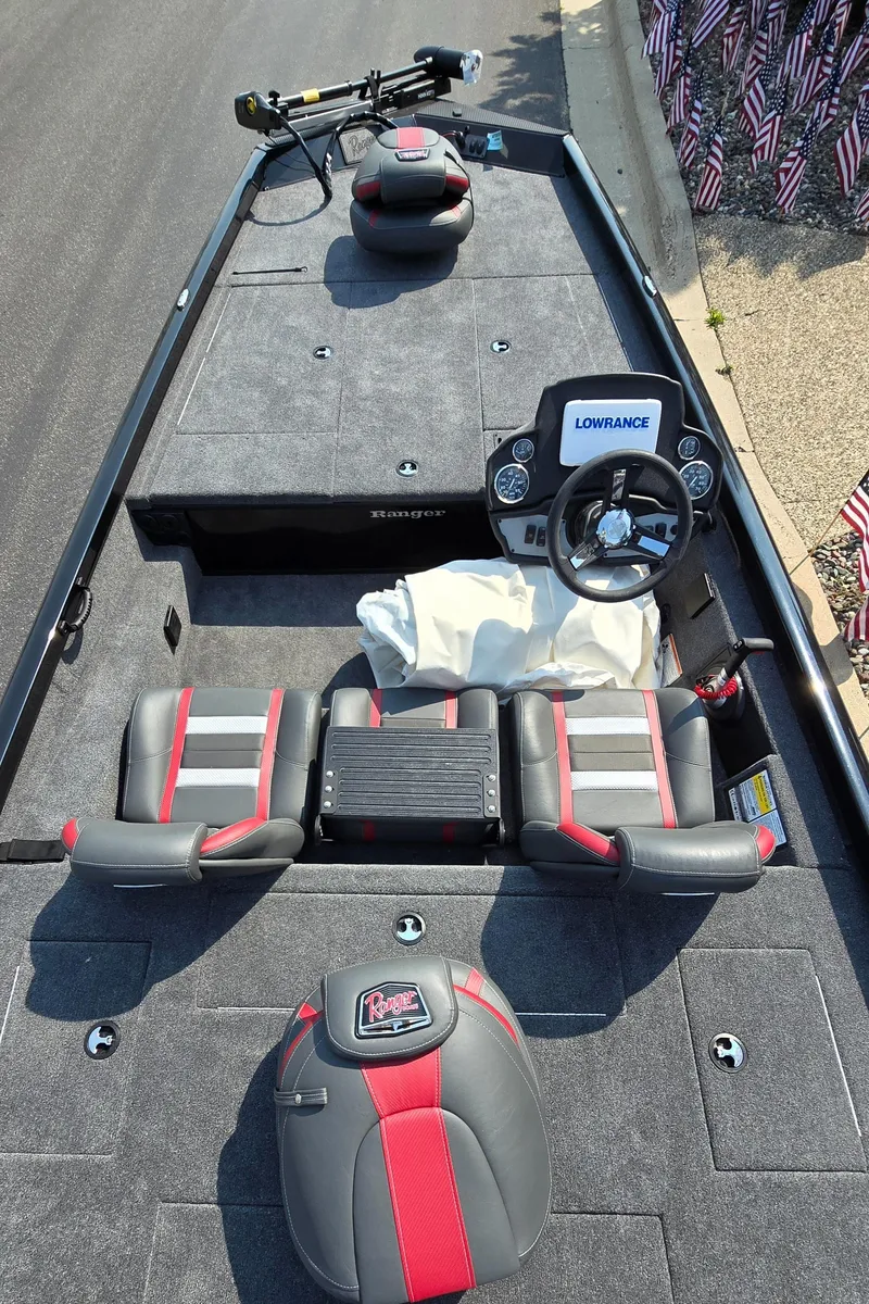 Slide: The Image of 2024 Ranger RT188 fishing boat interior with steering console and seating. - 4