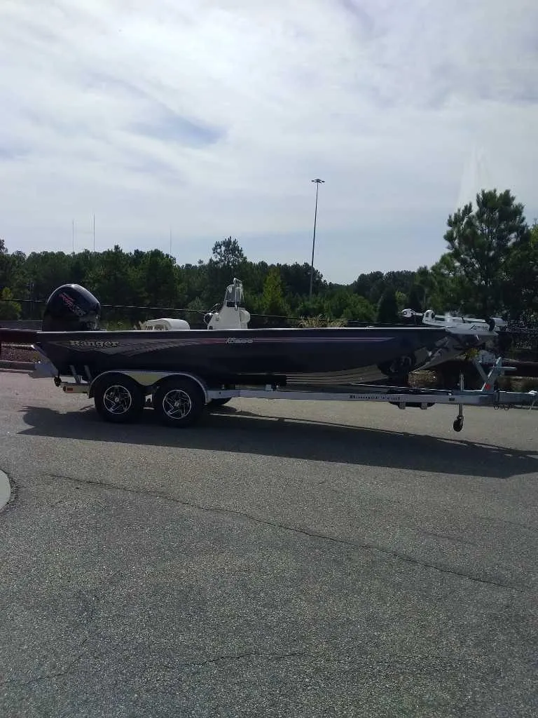 The Image of 2024 Ranger RB200 boat on trailer in outdoor setting. - 0