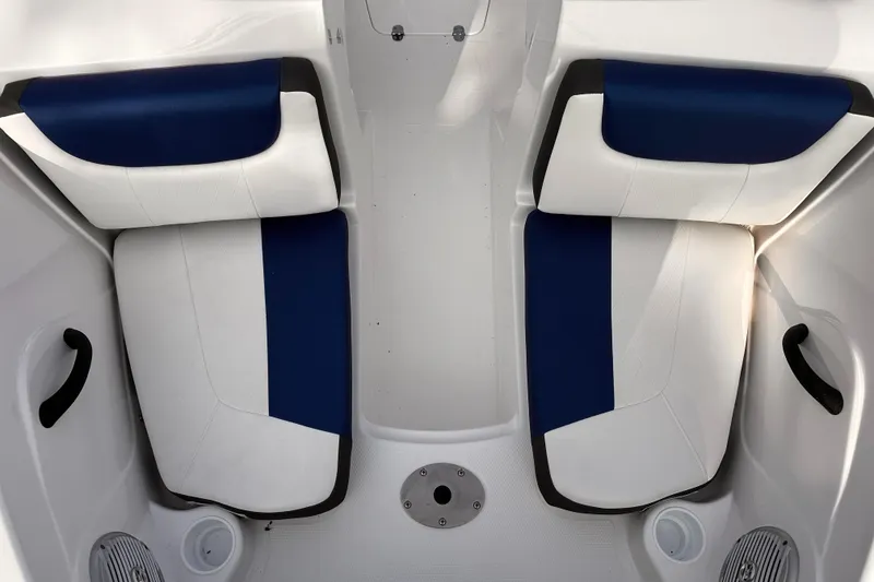 Slide: The Image of 2024 Tahoe 185 S boat interior with blue and white seating. - 8