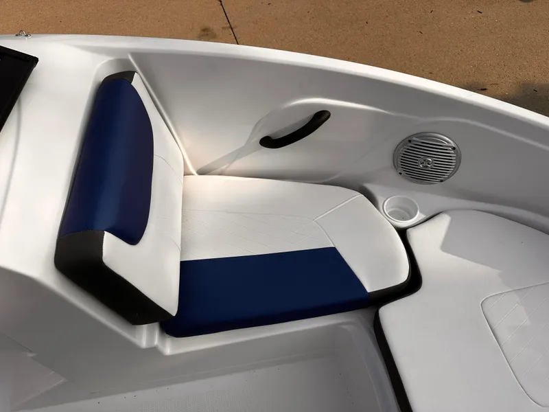 Slide: The Image of 2024 Tahoe 185 S boat interior with blue and white seating. - 9
