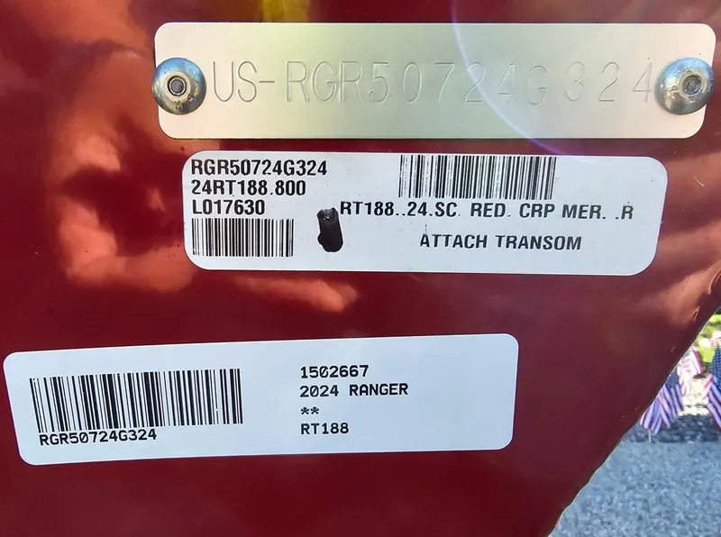 Slide: The Image of 2024 Ranger RT188 boat identification tags and serial numbers on red surface. - 3