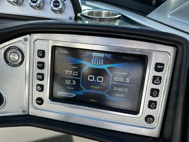 Slide: The Image of 2016 MasterCraft X46 dashboard display with digital controls and gauges. - 10