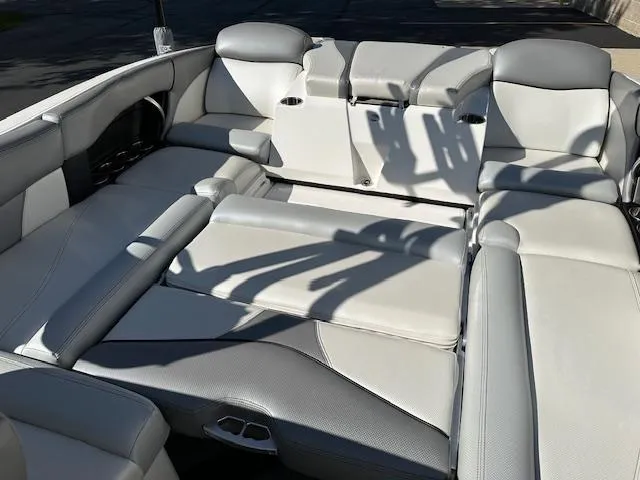Slide: The Image of 2016 MasterCraft X46 boat interior with gray and white seating. - 13
