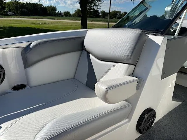 Slide: The Image of 2016 MasterCraft X46 boat interior with gray seating and armrest. - 20