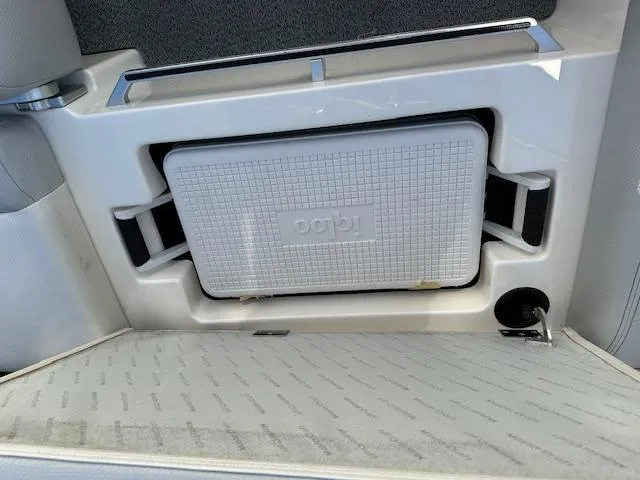 Slide: The Image of MasterCraft X46 2016 boat interior with built-in Igloo cooler compartment. - 24