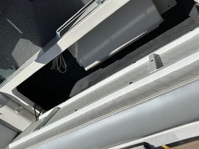 Slide: The Image of 2016 MasterCraft X46 boat interior detail with storage compartment. - 25