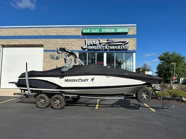 Slide: The Image of 2016 MasterCraft X46 boat on trailer outside Jerry's Majestic Marine dealership. - 28