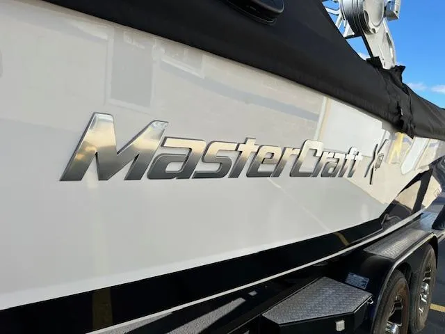 Slide: The Image of 2016 MasterCraft X46 boat with sleek design and logo. - 29