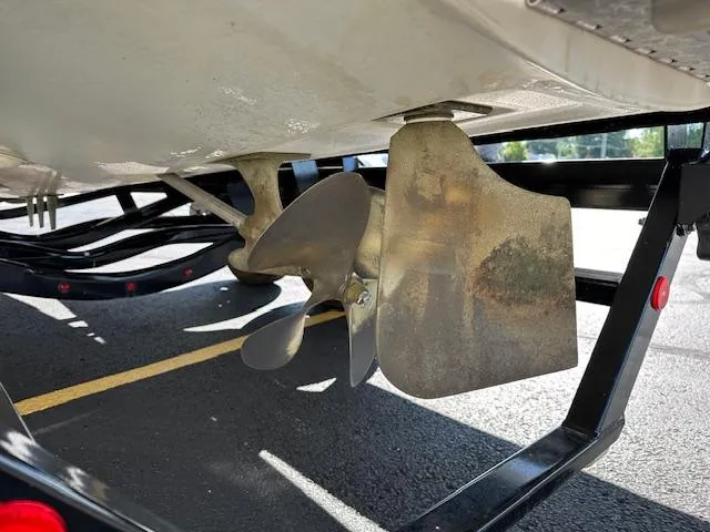 Slide: The Image of 2016 MasterCraft X46 boat propeller and rudder on trailer. - 31