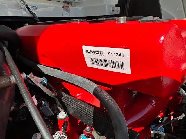 Slide: The Image of Close-up of a 2016 MasterCraft X46 Ilmor engine component with barcode. - 36