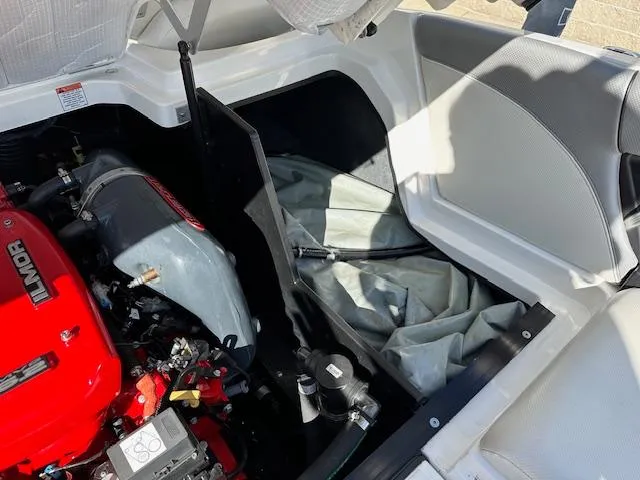 Slide: The Image of 2016 MasterCraft X46 engine compartment with Ilmor engine and storage area. - 37
