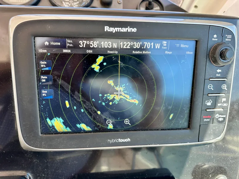 Slide: The Image of Raymarine navigation display on 2005 Albin Tournament Express boat showing radar data. - 17