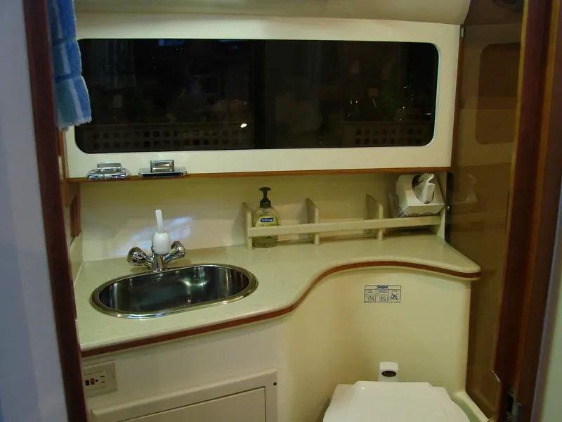 Slide: The Image of 2005 Albin Tournament Express boat bathroom with sink and toilet. - 46
