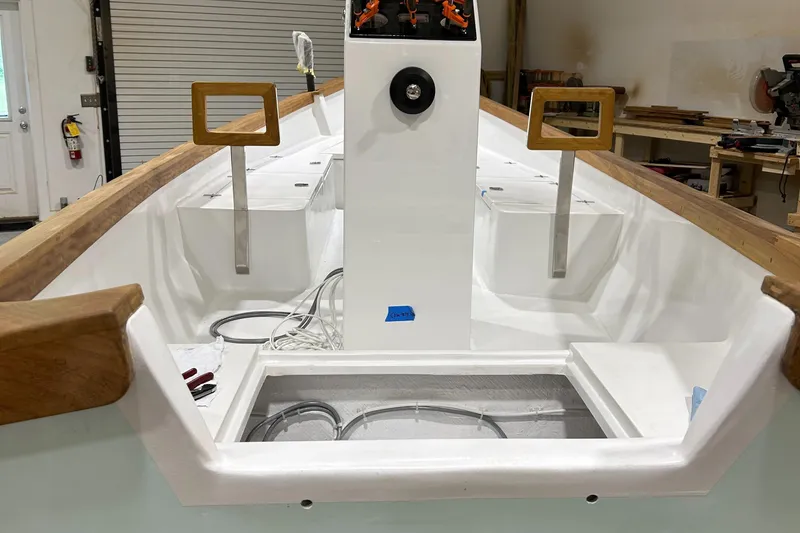 Slide: The Image of 2024 Caribiana Maracas boat interior with modern controls and sleek design. - 13