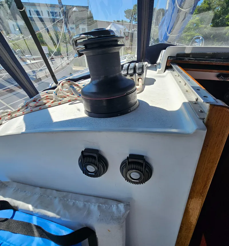 Slide: The Image of Winch and controls on a 2005 Nonsuch 33 sailboat deck. - 10