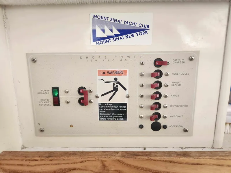 Slide: The Image of Electrical panel on a 1999 Bayliner 2452 Ciera Express at Mount Sinai Yacht Club. - 12